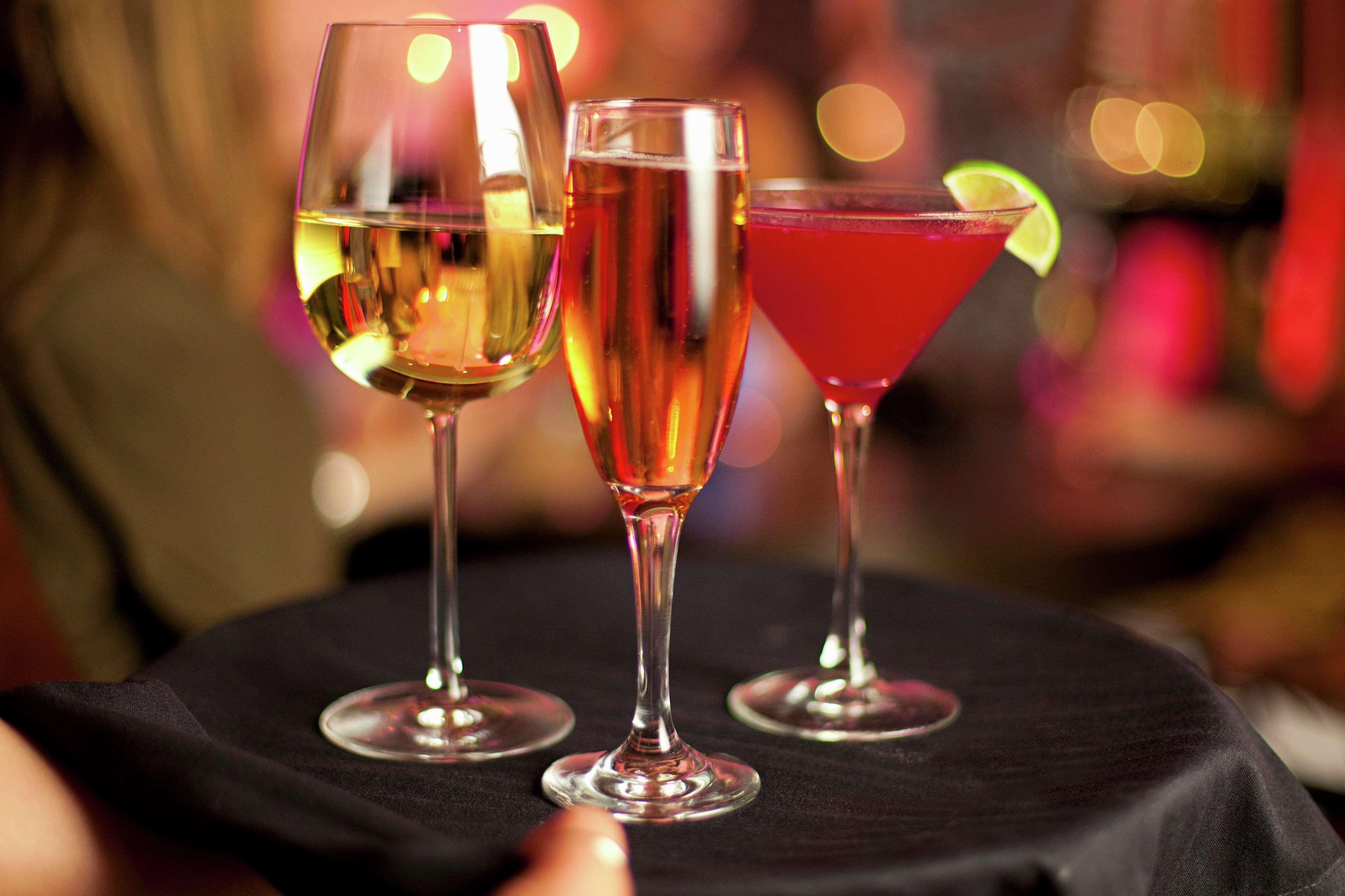 Hilton Mumbai International Airport Hotel Exterior photo A wine glass, champagne flute and cocktail glass