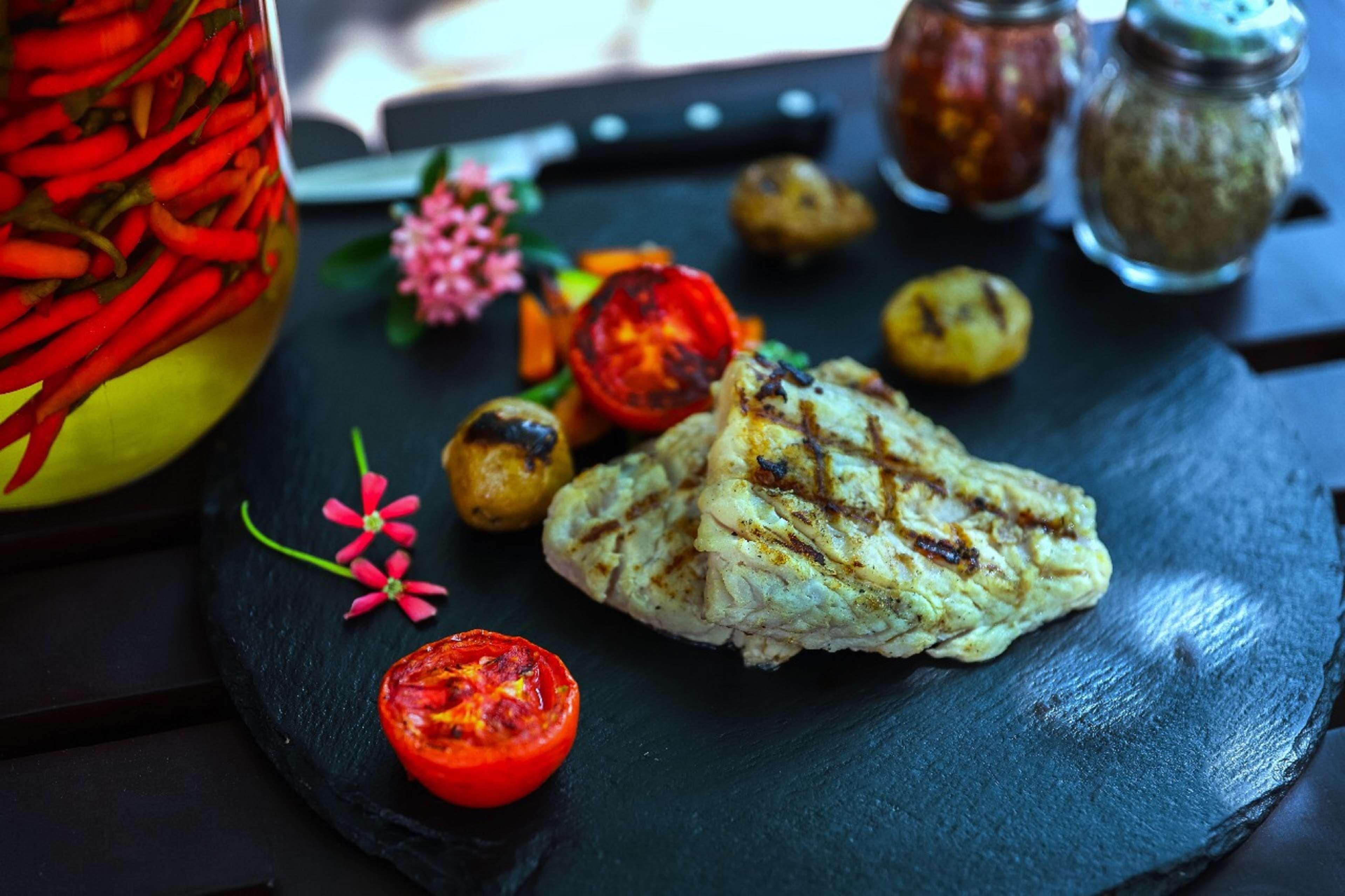 Hilton Mumbai International Airport Hotel Exterior photo Grilled halibut